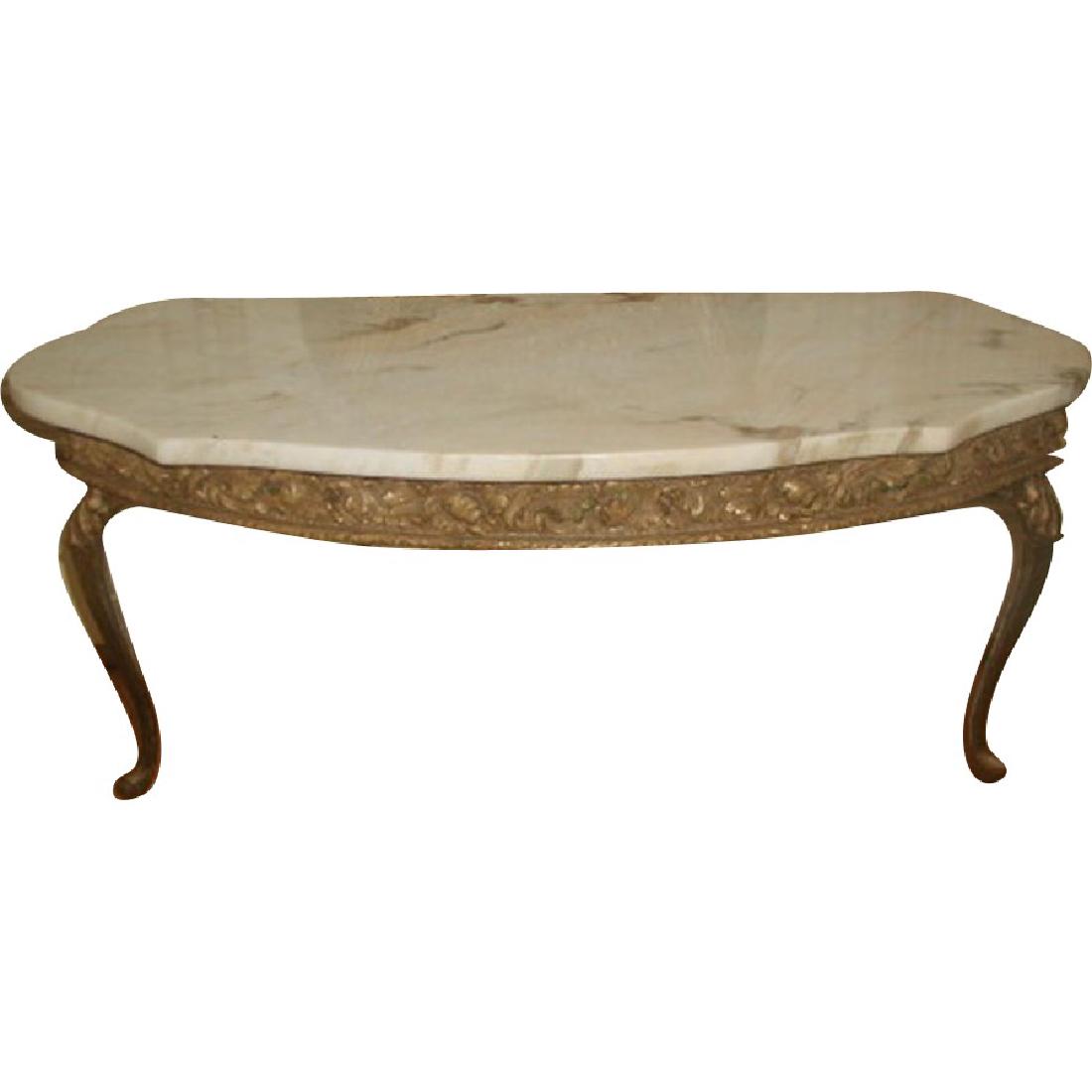 Italian Console Table Marble Top Gilt Early 1900's: Early 1900's Italian console table with attached marble top in antique cream background and camel and light brown veining with a hint of pink in some veins. Ornate gilt wood apron depicts acanthus lea