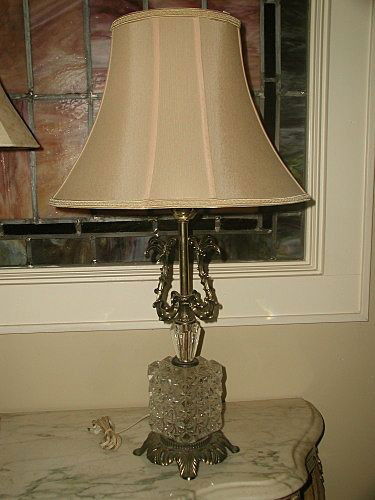 Crystal Brass Lamp New Silk Shade Rewired Early 19: Gorgeous early 1900's crystal and brass table lamp with new silk shade mid buff tone from Lake Shore Shades. Shade has small matching trim top and bottom with a semi-circular concave arch in the styli