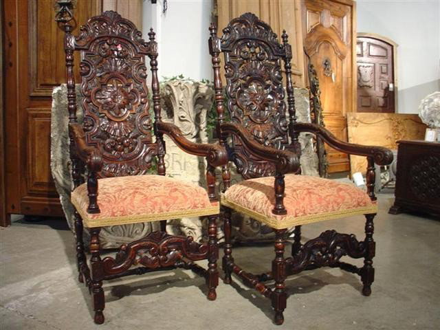 Pair of Antique Italian Walnut Wood Chairs: Upholstered Recently in a Silk Velvet Brocade ÐVery Good Condition- Minor rubs to wood ÐMid to Late 1800Õs This magnificent pair of antique Italian walnut wood arm chairs feature acanthus and flora