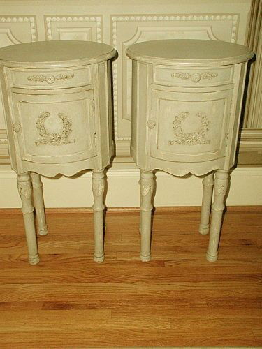 French Side Tables Hand Carving Painted Early 1900's: Pair of round unusual French side tables,night stands or end tables from early 1900's. Painted many years prior in cream/light gray with a slight texture due to antique brown waxing which has accented