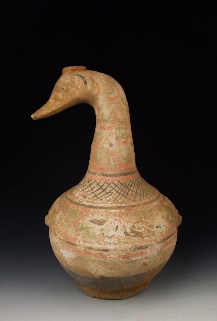 Han Dynasty Painted Gray-pottery Duck-shaped Vase: Here is one Painted Gray-pottery Duck-shaped Vase Height:18 inches, width:11 inches, Weight : 8.7 lbs, Condition :Some expected wear, degradation, natural crazing, abrasions, chips & minor losses, as 