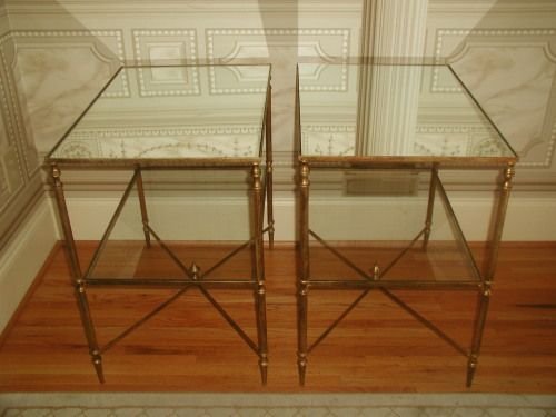 Neoclassical Side Tables Brass Glass Mirrored: Pair of handsome brass framed neoclassical side tables early 1900's. Good size to be used horizontally or vertically with new mirrored top shelf and glass bottom shelf on each which fit inside the bra
