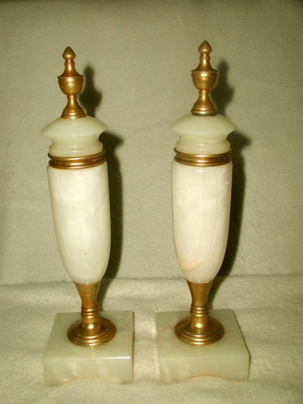 Italian Alabaster Cassolettes Bronze 19th Century: Pair of Italian antique cream alabaster cassolettes from the 19th century.Light veining in white and peach tones. Bronze finial caps,collar and pedestal.Stand on square bases with arches. Probably ori