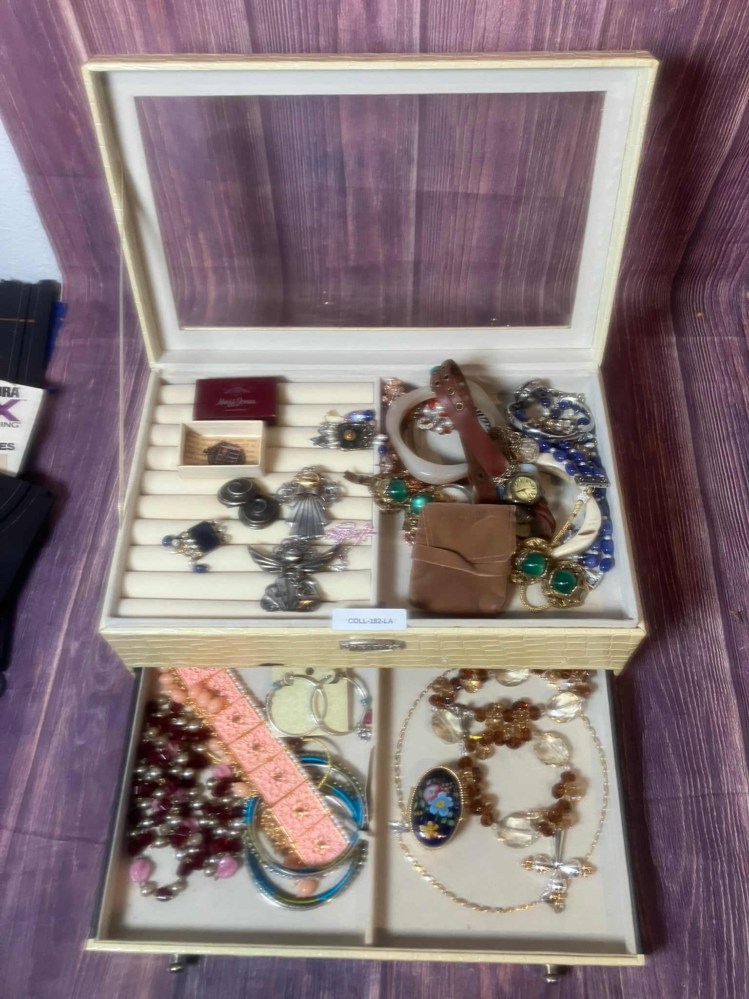 Large Costume Jewelry Lot – Brooches Bracelets Necklaces Earrings: Large Vintage Costume Jewelry Lot – Brooches Bracelets Necklaces Earrings. Multiple brooches (including angel, floral, rhinestone, and silver tone designs)Bracelets – bangles, linked styles, beade