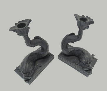 Wedgwood Black Basalt Dolphin Candlesticks Assembled Pair c.1974: Wedgwood Black Basalt Dolphin Candlesticks Assembled Pair c.1974. Foliate candlesticks nozzles atop scrolled flowing tails, mounted on a rectangular base bordered with shells, impressed marks, approx