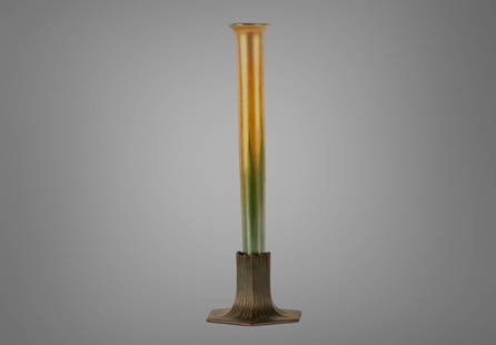 Louis Comfort Tiffany Bud Vase Bronze Vase: Louis Comfort Tiffany Bronze and pull feather favrile iridescent art glass vase both signed bronze base with model 712 Approx. H11 1/18" x W3 1/2"