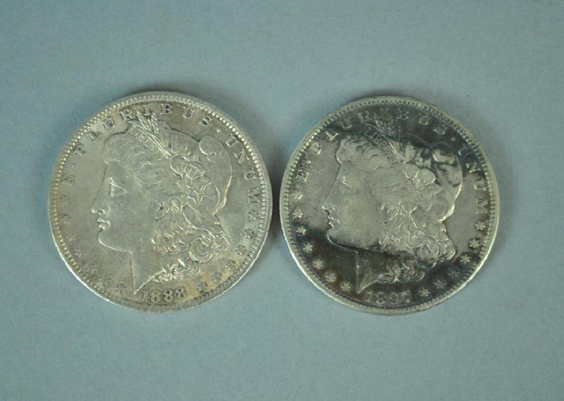 (2) MORGAN US SILVER DOLLAR COINS (1 of 2)