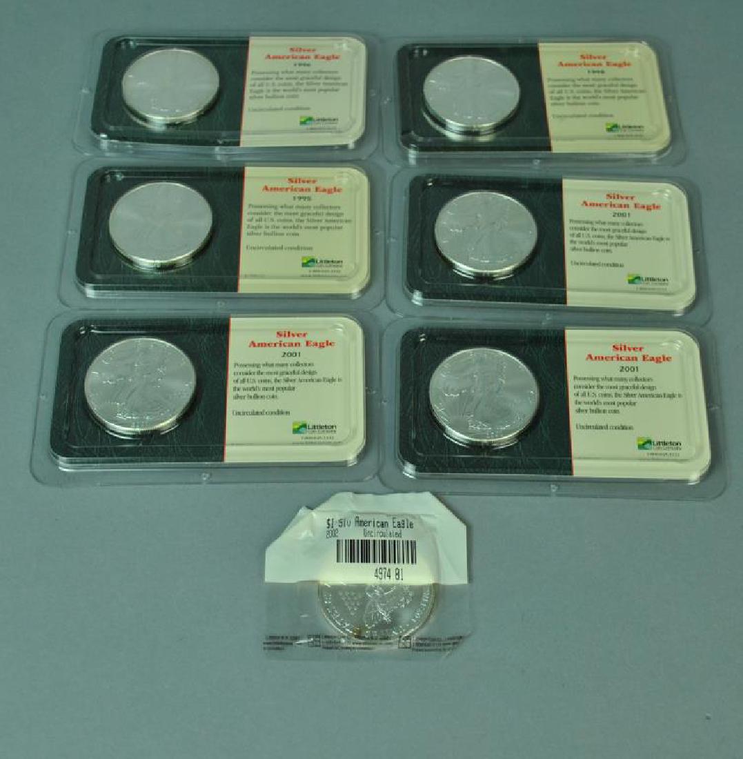 (7) UNCIRCULATED AMERICAN EAGLE SILVER DOLLARS (1 of 2)