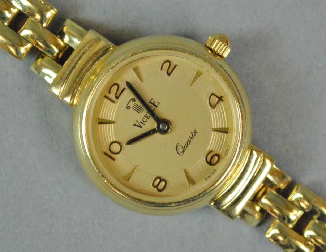 LADIES VICENCE GOLD BRACELET WATCH: 21mm, dial marked 'VicencE Quartz Swiss Movt', case stamped '14K Italy Milor Water Resistant', clasp stamped '14K Italy Milor', bracelet height 7mm, length 7.5in., gross weight 23.5gms. (the watch is 