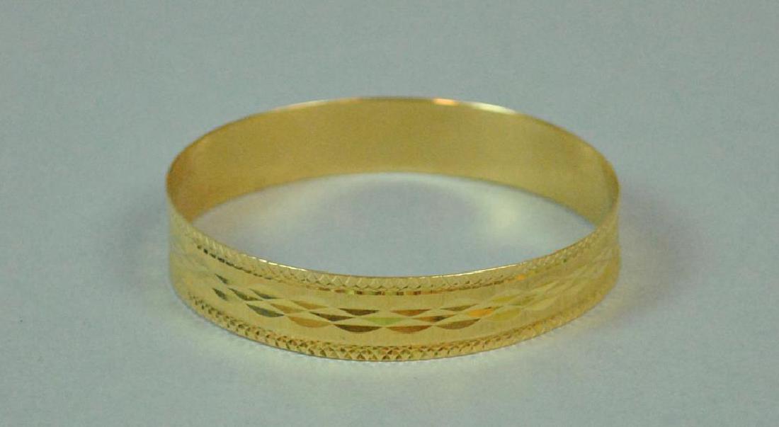 18K DIAMOND CUT BANGLE BRACELET (1 of 2)