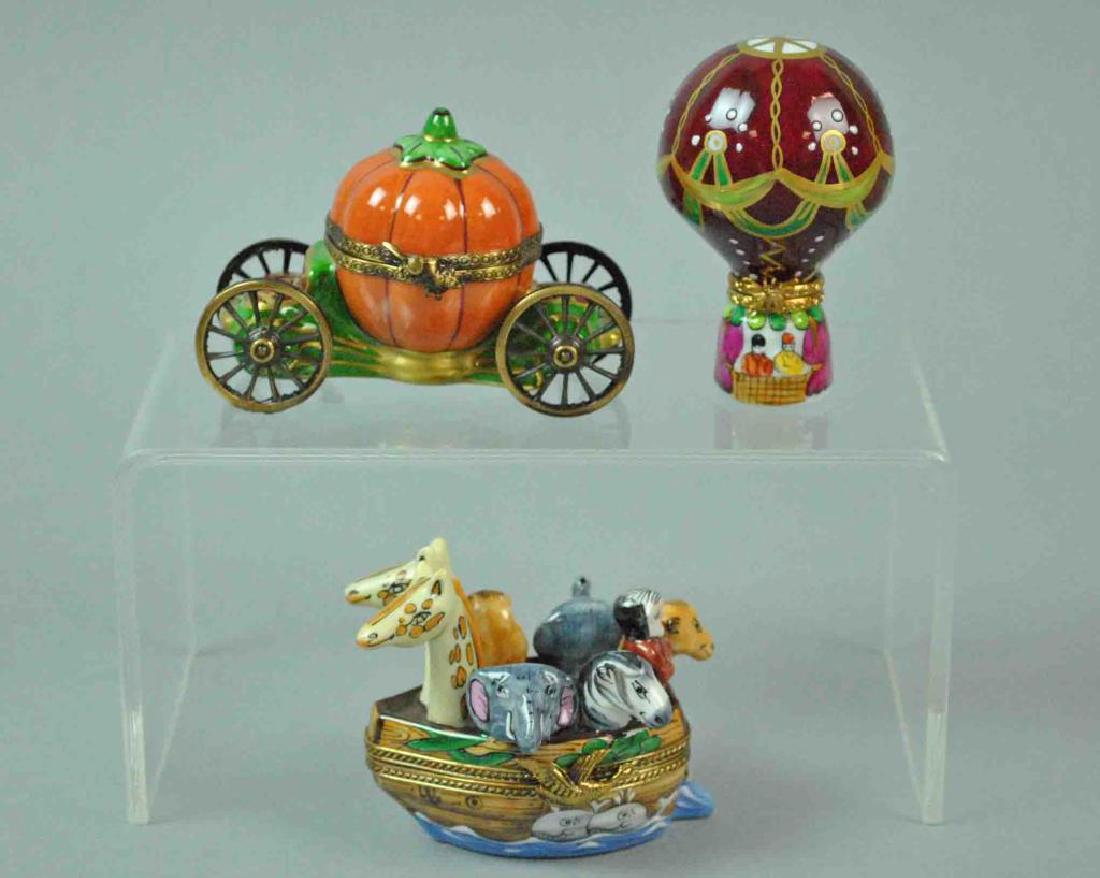 (3) ASSORTED LIMOGES BOXES: including a Cinderella pumpkin coach, Noah's Ark, and a hot air balloon, various Limoges marks, overall good condition, tallest 2.75in.