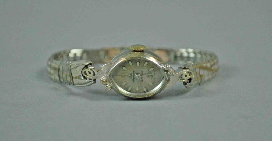 JULES JURGENSEN DIAMOND ACCENTED GOLD CASE WATCH (1 of 2)