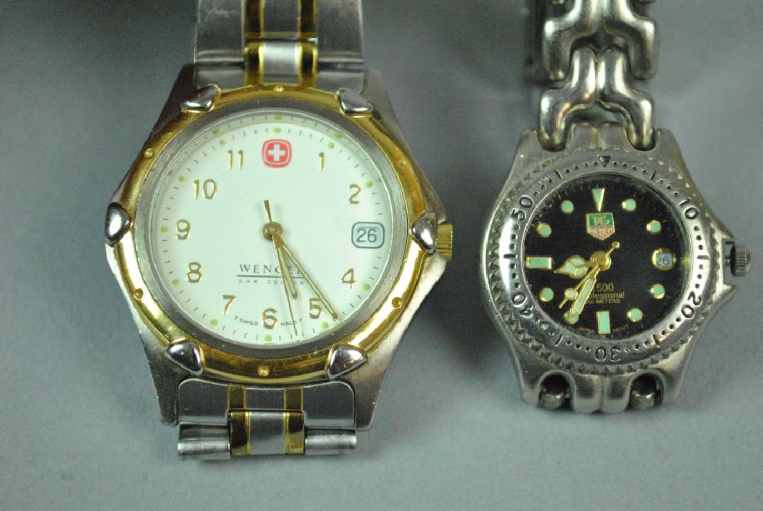 (2) STAINLESS STEEL WATCHES - TAG HEUER & WENGER: including a 25mm Tag Heuer 1500 Professional, and a 35mm Wenger S.A.K. Design, overall good condition, each currently running, however not guaranteed