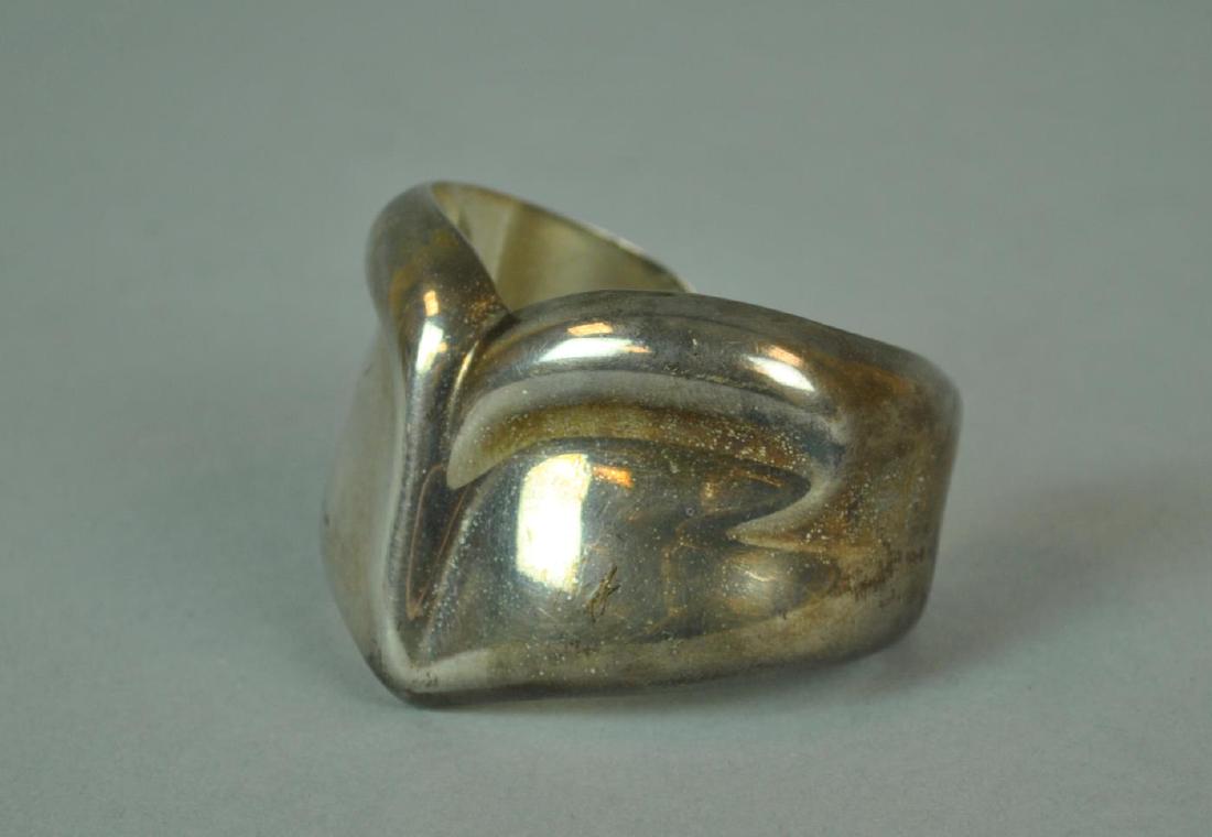 ELSA PERETTI FOR TIFFANY & CO. STERLING CUFF: stamped 'Peretti Tiffany & Co. Italy 1979 Sterling 925', height 1.8in., interior diameter 2.2x1.7in., 2.5ozt.