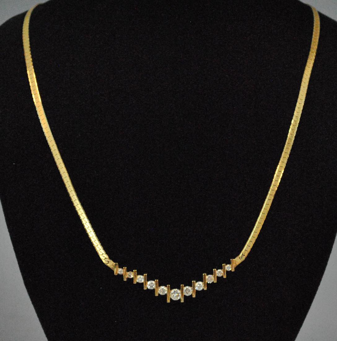 DIAMOND HERRINGBONE CHOKER: DIAMOND HERRINGBONE CHOKER set with 11 round graduated diamonds approx. 0.86 carats, stamped '14Kt Italy', 16in., 9.4gms.