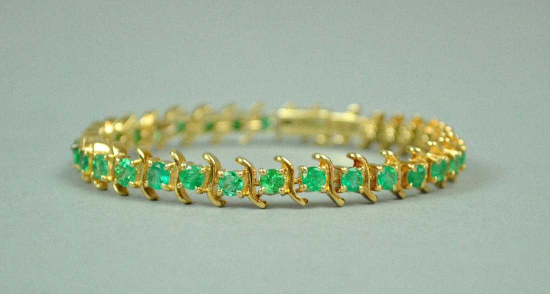 18K EMERALD TENNIS BRACELET, 6.50CTW (1 of 5)