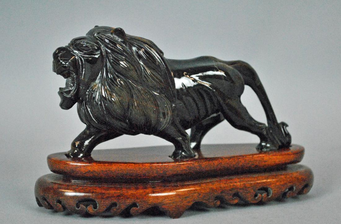 CHINESE CARVED TIGER EYE LION SCULPTURE (1 of 3)
