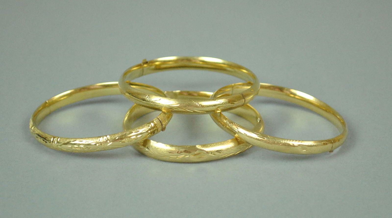 (4) 14K SLIDE HINGE BANGLES (1 of 2)