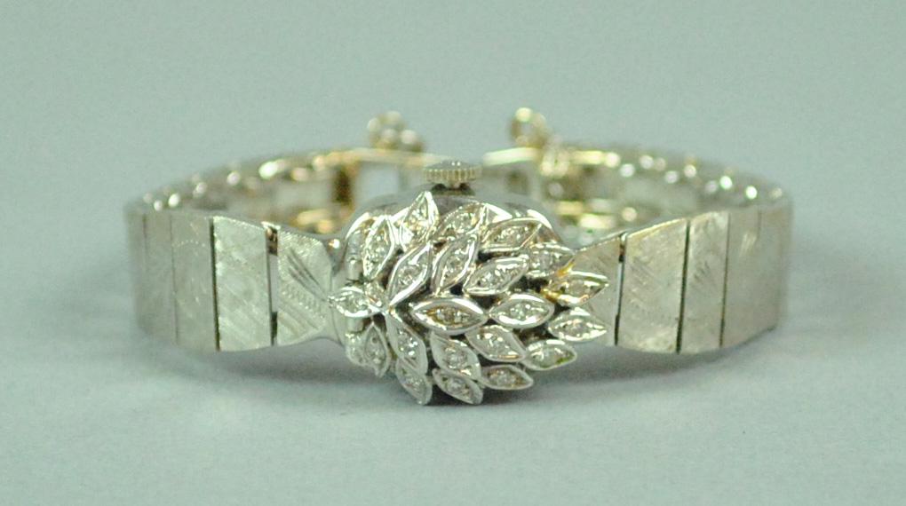 14K DIAMOND COVERED BRACELET WATCH (1 of 2)