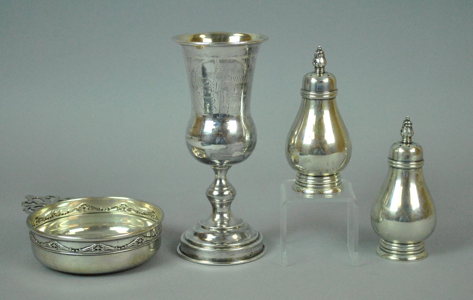 (4) PIECE SILVER TABLEWARE GROUP: (4) PIECE SILVER TABLEWARE GROUP including a pair of International sterling salt & pepper shakers in Royal Danish pattern, a Gorham sterling wine tasting cup, and an 800 silver Kiddush cup stamped 84,