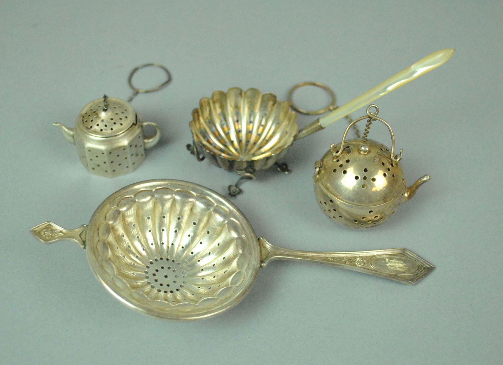 (4) SILVER STRAINERS (1 of 3)