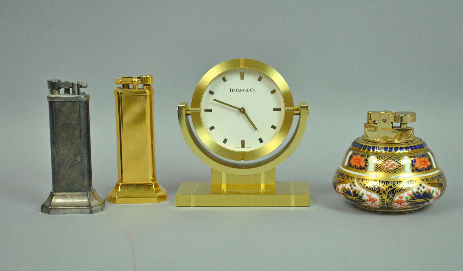 (3) LIGHTERS AND A TIFFANY DESK CLOCK (1 of 1)
