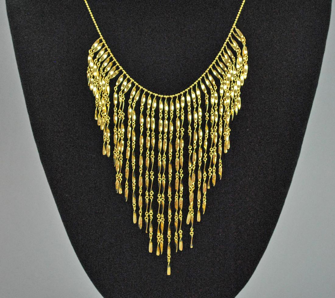 14K TASSEL LINK NECKLACE: 14K TASSEL LINK NECKLACE stamped '14KT Italy', tassel links measure 1-3.75in., adjustable ball link neckchain measures 15-17in., 16.9gms.