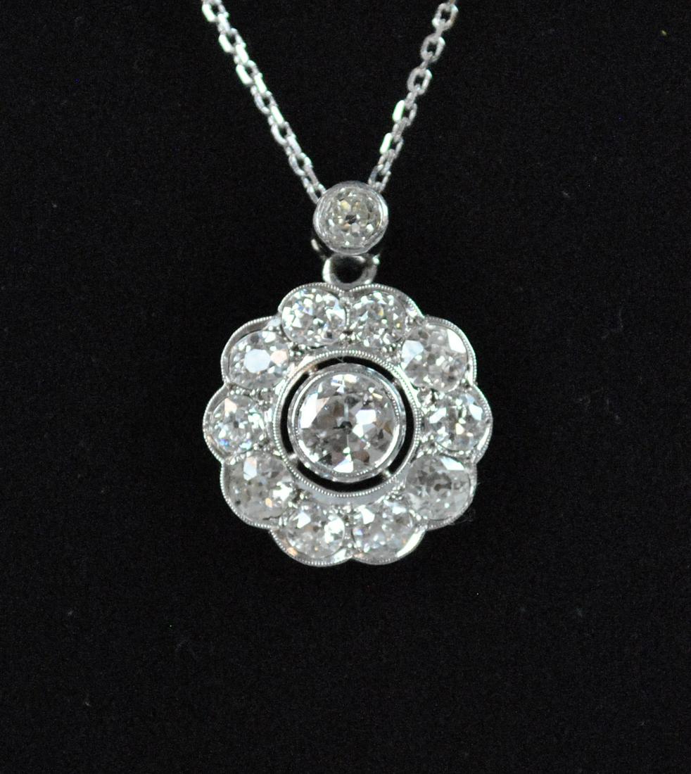 PLATINUM & DIAMOND HALO PENDANT ON 14K CHAIN (1 of 2)