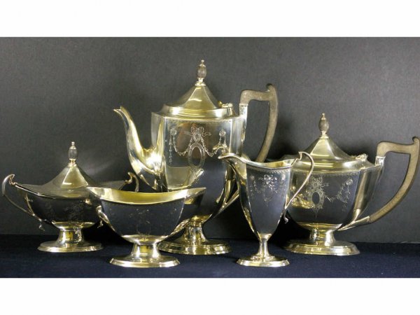 THEODORE B. STARR 5-PC. STERLING COFFEE & TEA SET: includes a coffee pot, teapot, covered sugar, creamer and waste bowl, all marked on base Made In England For Theodore B. Starr, New York", all bearing hallmark "R&B" for Roberts & Belk Ltd., Sheffield