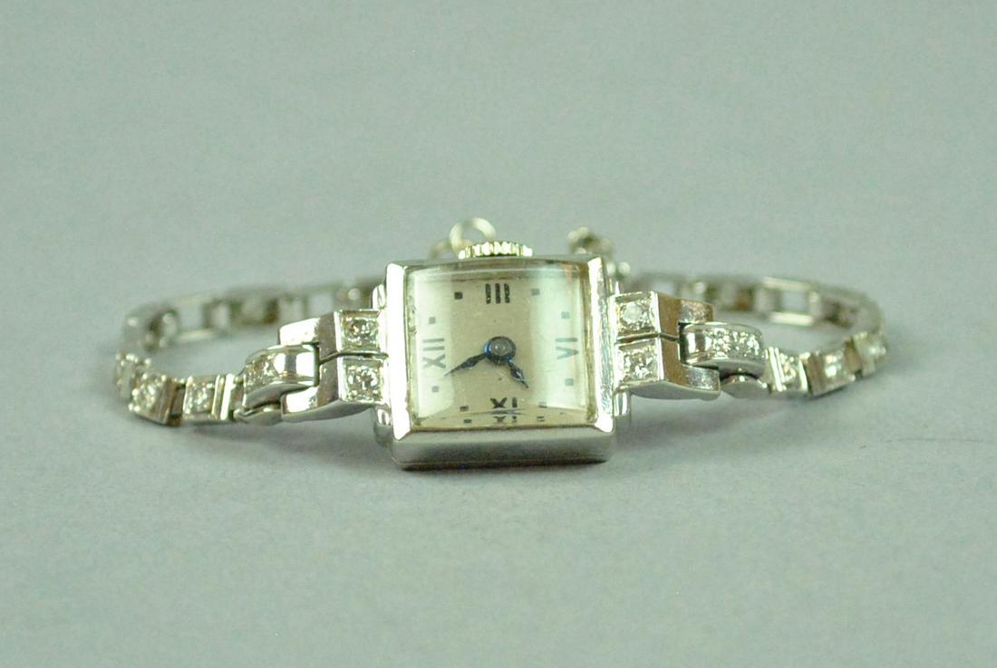 LADIES 14K DIAMOND BRACELET WATCH (1 of 3)