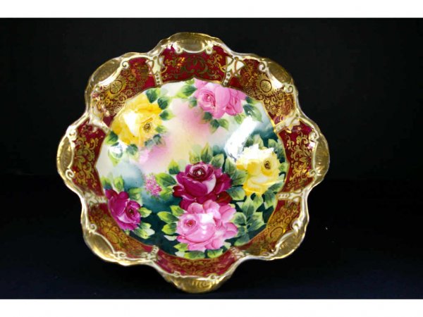 ROYAL NIPPON ROSE-DECORATED BOWL: hand-painted depicting red, pink and yellow roses, embellished with gilding, footed base, together with a Nippon rose-decorated and gilded platter, each 11in.