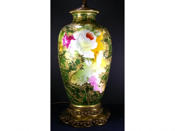 LARGE NIPPON VASE FITTED AS A LAMP: decorated in pink and white roses on green gilded ground, overall size 30in.