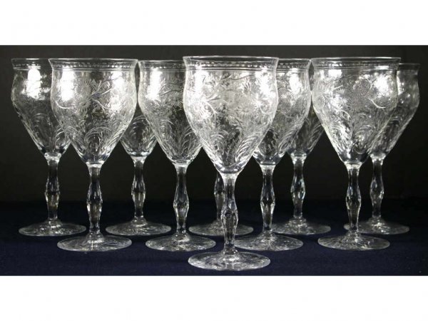 SET OF 10 VINTAGE WEBB CORBETT CRYSTAL WINES: marked "Webb Corbett / Made in England", in floral and foliate decoration, 7.5in.