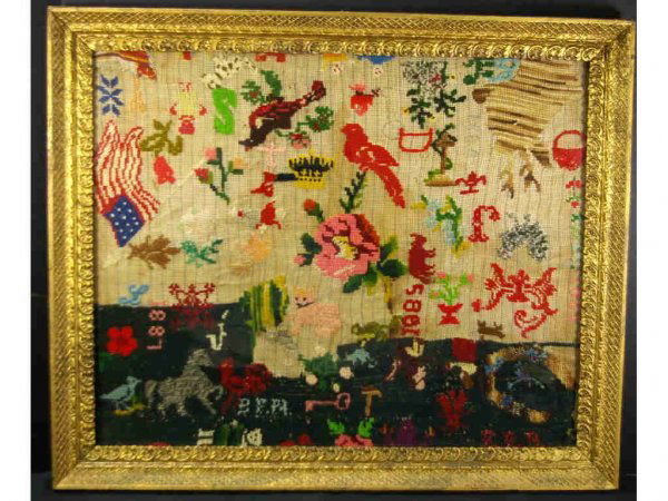 NEEDLWORK SAMPLER WITH VARIOUS 1880 DATES: depicting a busy array of colorful motifs including an American flag, a crown, a key, a cross, figures, trees, flowers, letters, and various animals and birds including a reindeer, rhinoceros, horse,