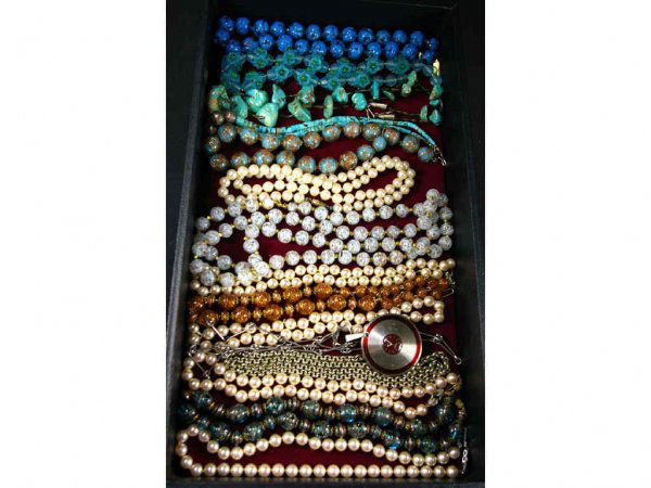 15-PIECE COSTUME NECKLACE GROUP: includes glass beads, faux pearls, turquoise, a Tissot watch pendant, and other examples