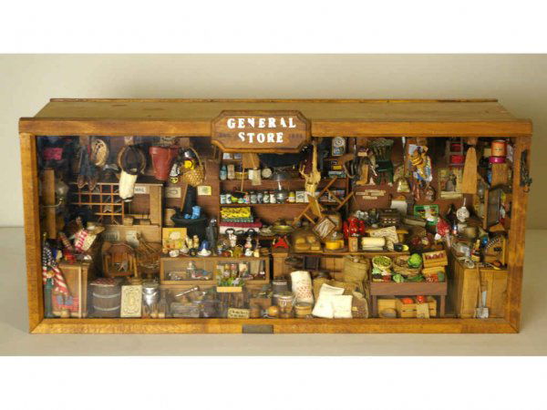 DIORAMA OF A GENERAL STORE: highly detailed including walls signs, fully stocked display cases and tables, detailed mail room, shelving loaded with supplies, hanging and bagged goods, etc., many hundreds of items including an ap