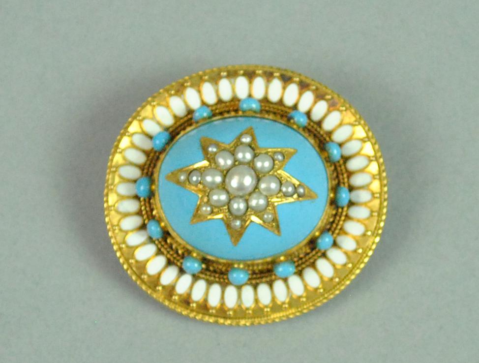 14K TURQUOISE & SEED PEARL LOCKET BROOCH: in Etruscan style featuring a star-set seed pearl cluster centering a large domed turquoise stone, accented with white enamel and turquoise bead surrounds (some scant and minor enamel chips and cracks