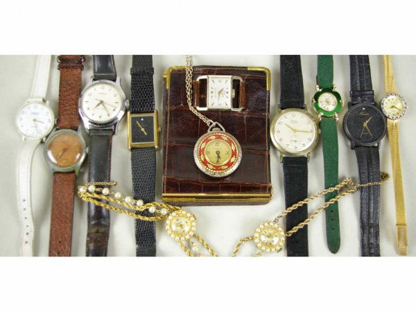 TWELVE WATCHES: including a Lear billfold watch, a Deauville Armitron bracelet watch with blue and red-color stones around face, Ardath, Lucerne watch pendant, Peugeot, etc., as is