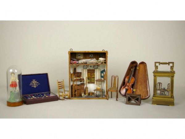 8-PIECE CHILD'S LOT: including a sitting room diorama in a clock case (side glass panel with fracture), a diorama farm house room with loft, a wax doll under dome, miniatures including two chairs, a book holder, a violin
