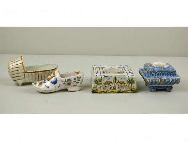 FOUR EARLY CERAMICS: comprising two ink stands including a Delft example, a cradle, and a Delft shoe, largest 3.5x6in. (losses and defects) The Knoop Collection