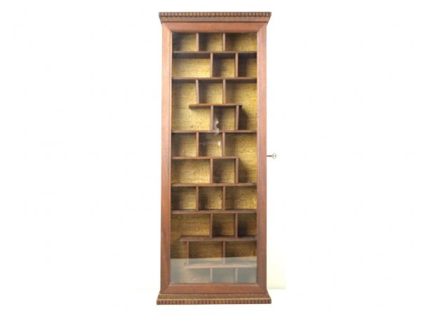 ASIAN-STYLE WALL-MOUNTED DISPLAY CABINET: in walnut, with key locking glazed door, 32x13x4in. The Knoop Collection
