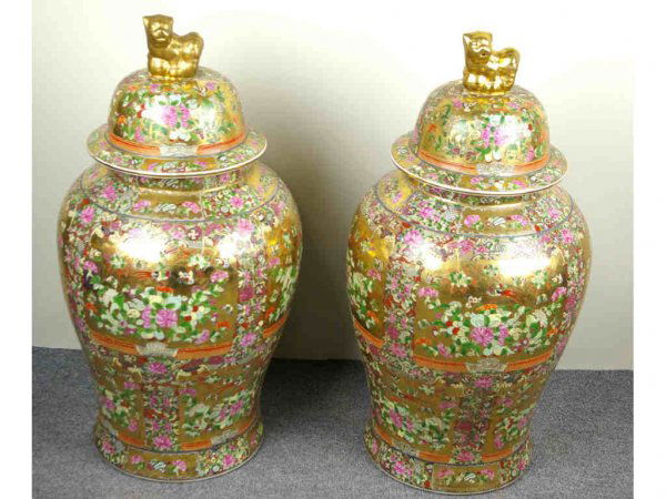 PAIR OF CONTEMPORARY GINGER JARS OF LARGE SIZE: with foo dog finials, in gilt and floral design, 32in.
