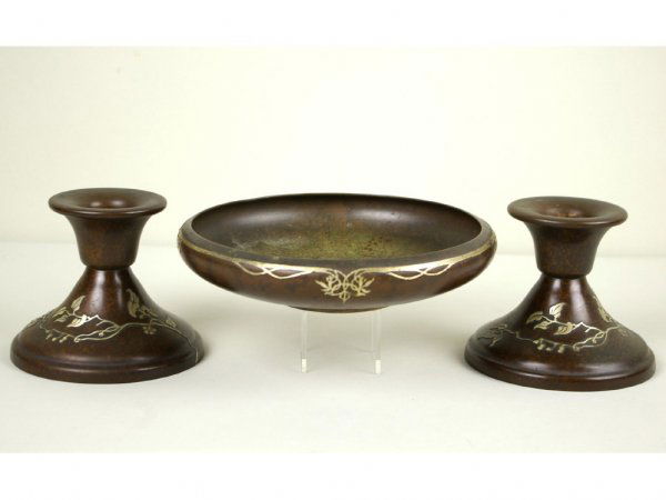 HEINTZ ART NOUVEAU BRONZE AND SILVER GARNITURE SET: including a 9" diameter center bowl and two matching 5" candlesticks, retailed by RH Macy, bearing diamond mark, one candlestick numbered 3128
