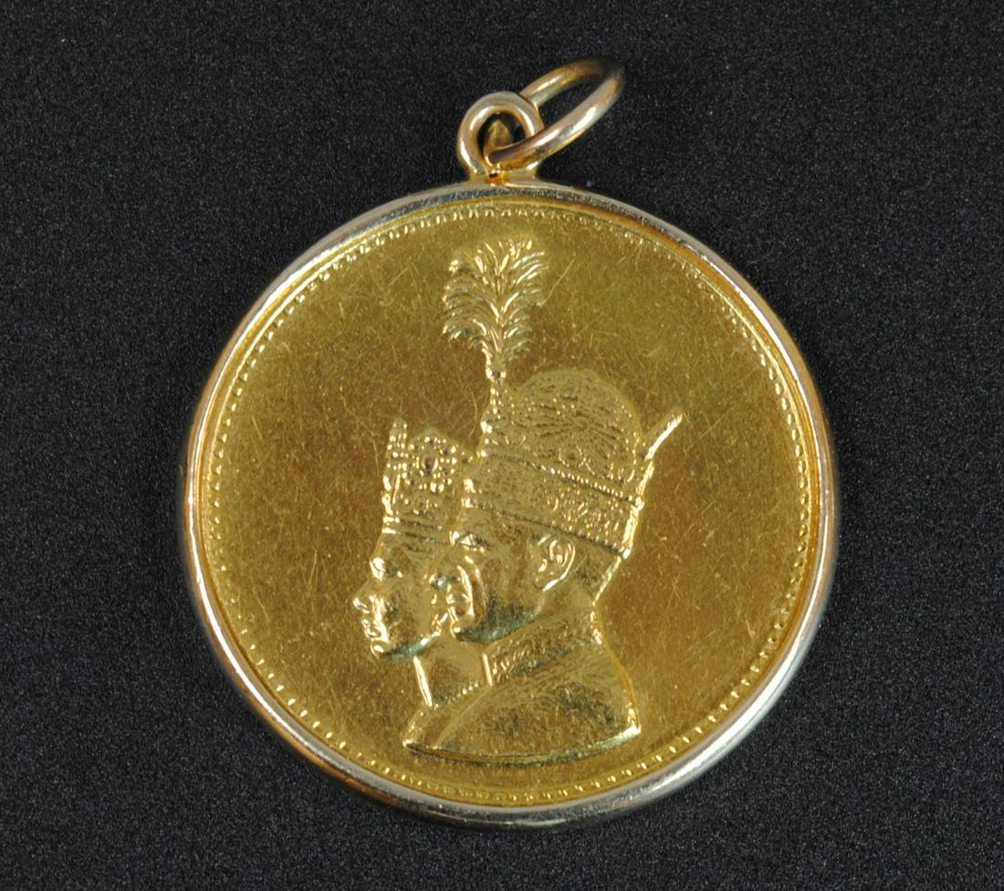 IRAN MOHAMMAD REZA PAHLAVI CORONATION GOLD MEDAL: 1967, .900 gold (21.6K), mounted in a 14K pendant holder (tested), very minor rubs / abrasions, medal 24mm, .3038 ozt., gross weight .370ozt., Opening Bid $300