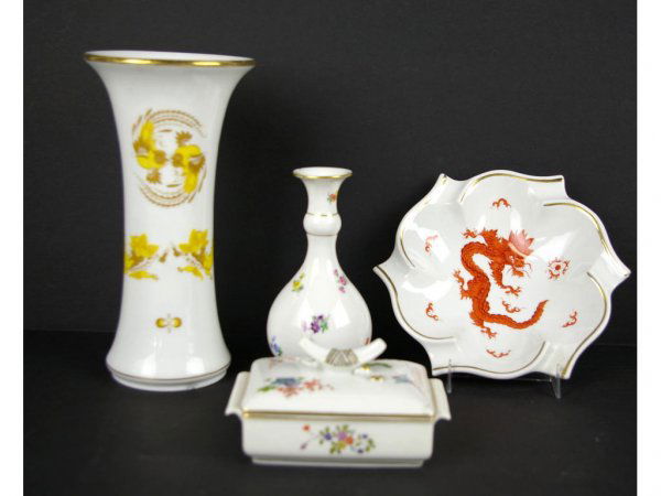 FOUR MEISSEN AS-IS PORCELAINS: including a 9" vase, a 6" bud vase, an 8" dragon-motif dish, and a 5" Asian-style covered box, all with underglaze blue crossed swords marks