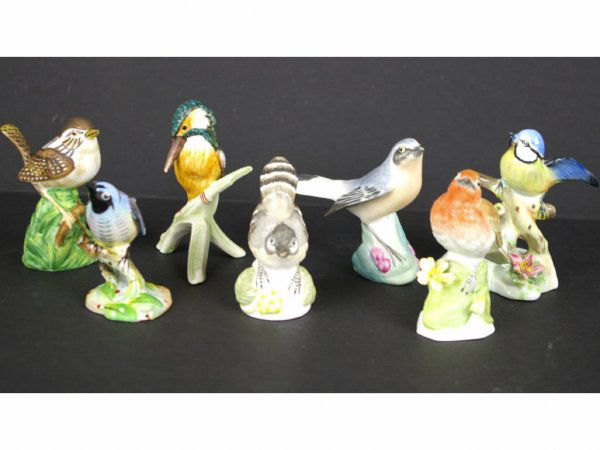7-PIECE BIRD GROUP: including three Staffordshire, two Royal Adderly, Spode and Goebel, tallest 4in.