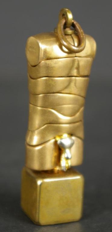 MIGUEL BERROCAL MICRODAVID-OFF MINIATURE BRONZE: puzzle sculpture/pendant depicting a nude male torso, marked "Berrocal" on side of shoulder, 2.5in.