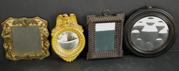 FOUR UNUSUAL MINIATURE MIRRORS: including a gilded glass bullseye mirror, tramp art, stumpwork-style, etc., largest 6in. The Knoop Collection