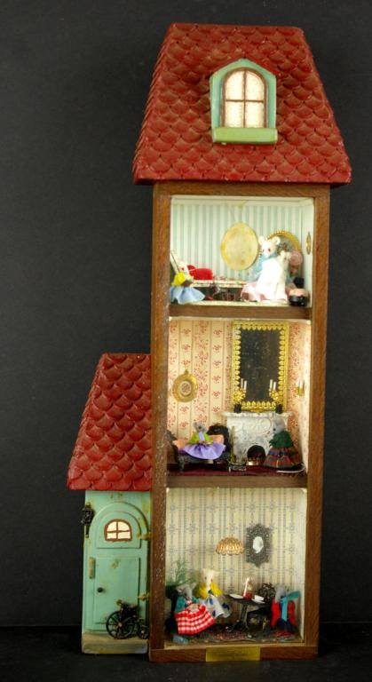 TRI-LEVEL DIORAMA OF A MOUSE HOUSE: by Jeanne Knoop c.1975, including miniature furniture, decorations, etc., 23x9in. The Knoop Collection