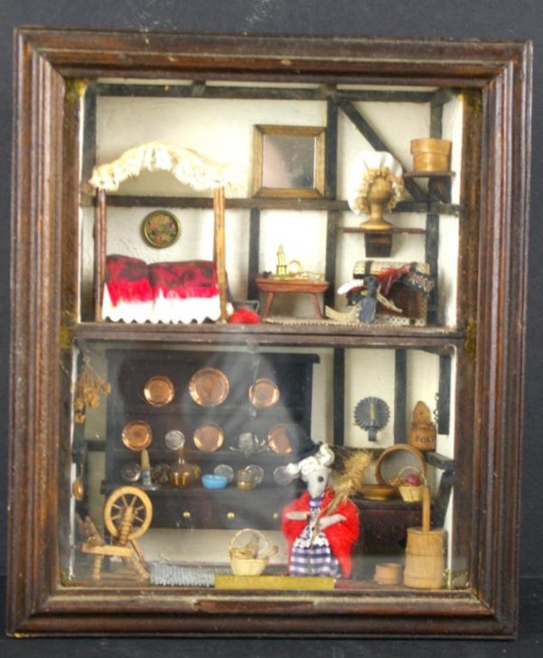 WELSH LADY MOUSE TUDOR DIORAMA: miniatures include an oak dresser, spinning wheel, canopy bed, copper plates, amber glass, etc., 10x9in. The Knoop Collection